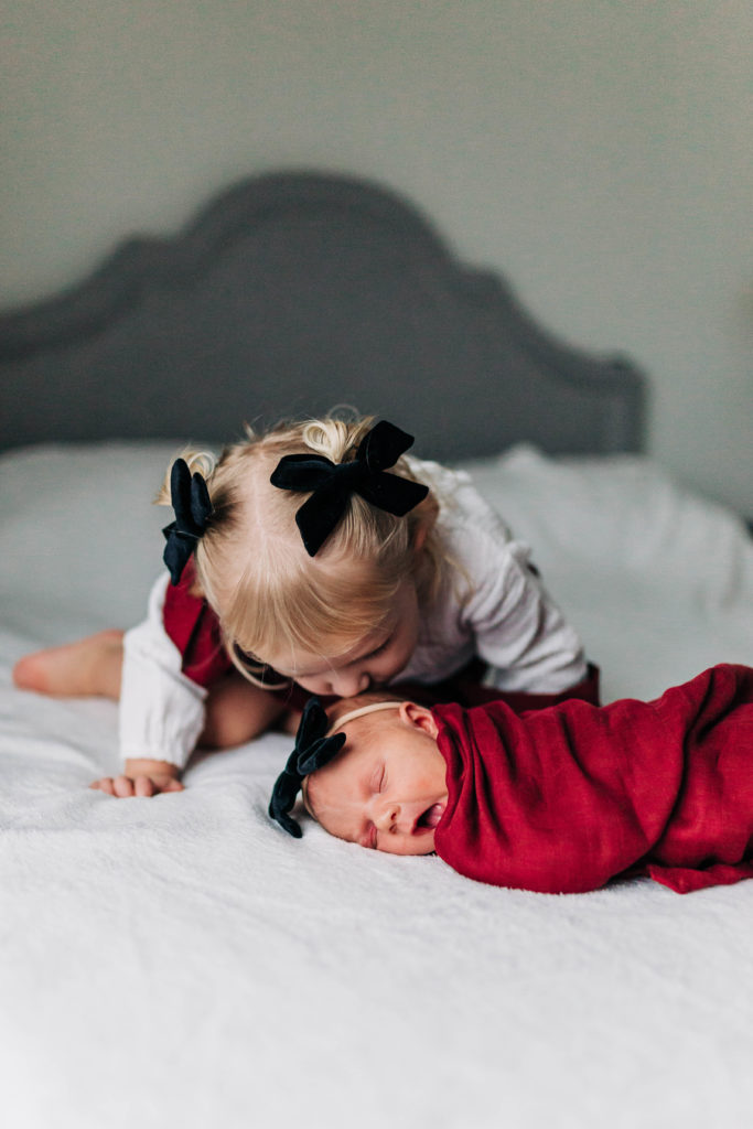 newborn with sibling photo