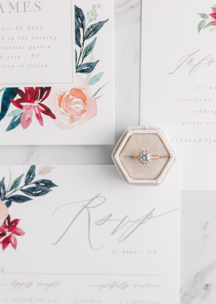 wedding ring and invitation suite