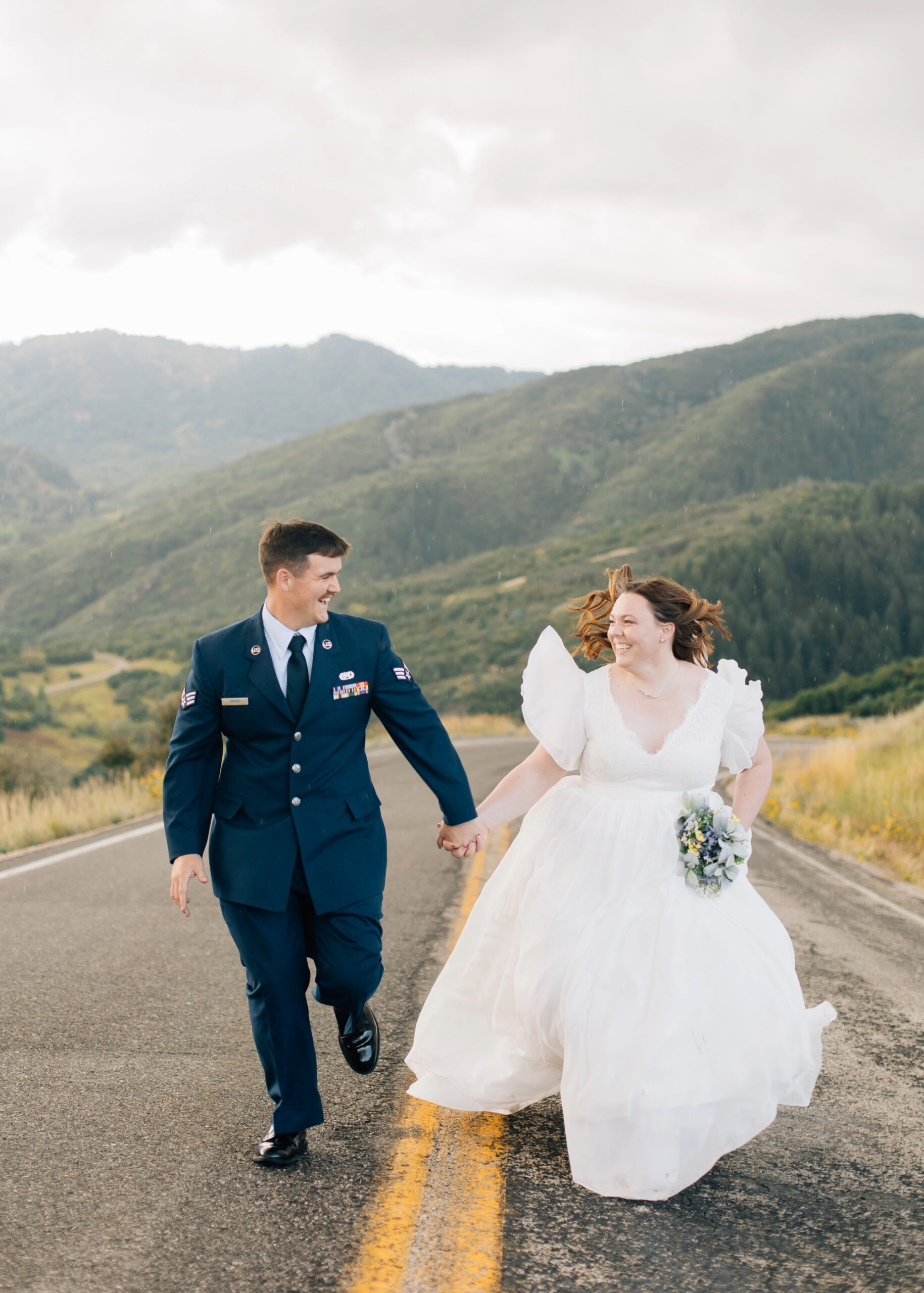 Wedding photos running up the road